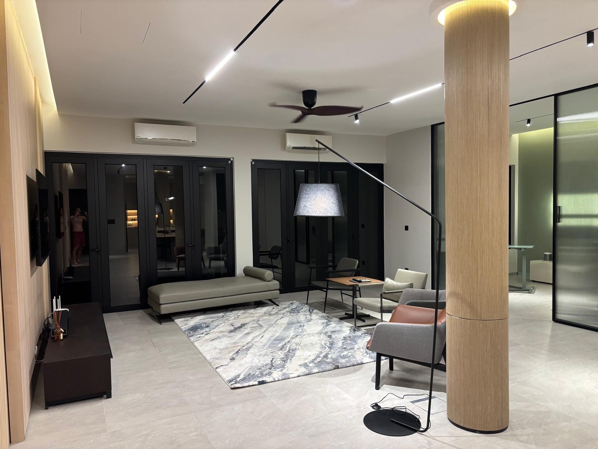 Living room with curated art and soft lighting